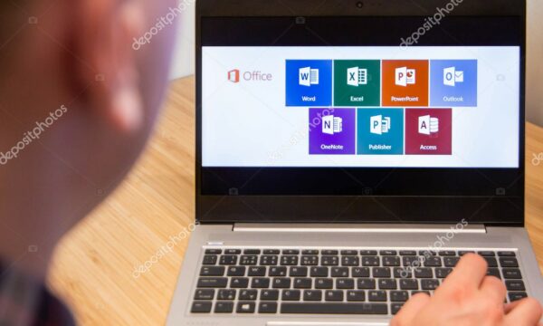 Office 365 is used by a man on the laptop. Microsoft customer used computer software. New product is tested by IT specialist. San Francisco, February 2020