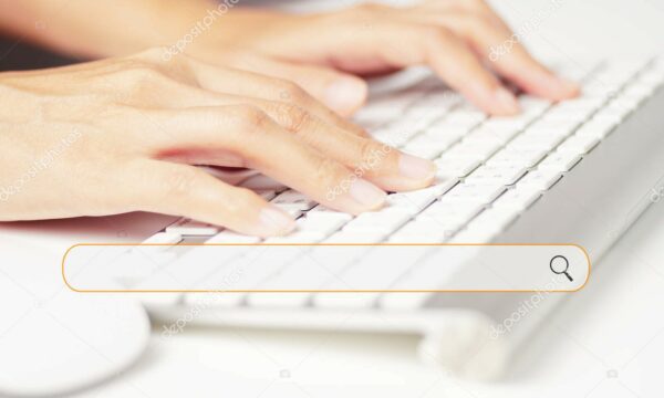 close female hands typing computer